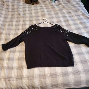 Woman's black sweater